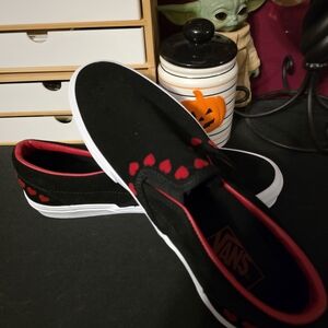 Vans Black Slip-On Shoes with Red Hearts